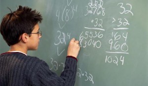 Performing Math Calculations at Chalkboard